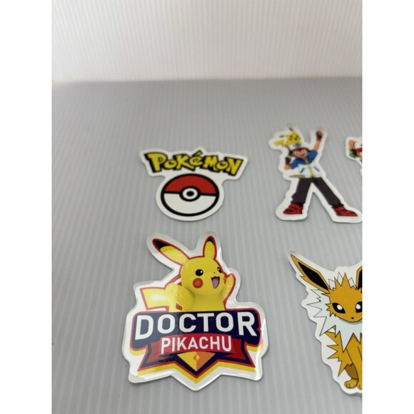 Pokémon Sticker Lot 14pc Vinyl Stickers Pikachu Eevee Cartoon Laptop NEW - Picture 2 of 6
